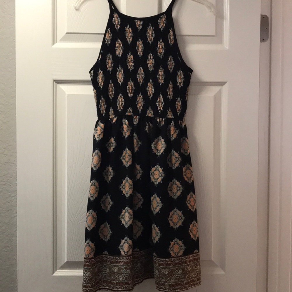 Razorback pattern black dress